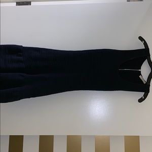 Sandro navy blue knit dress with open back.
